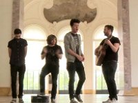 Bastille  Performing inside a marble gallery.